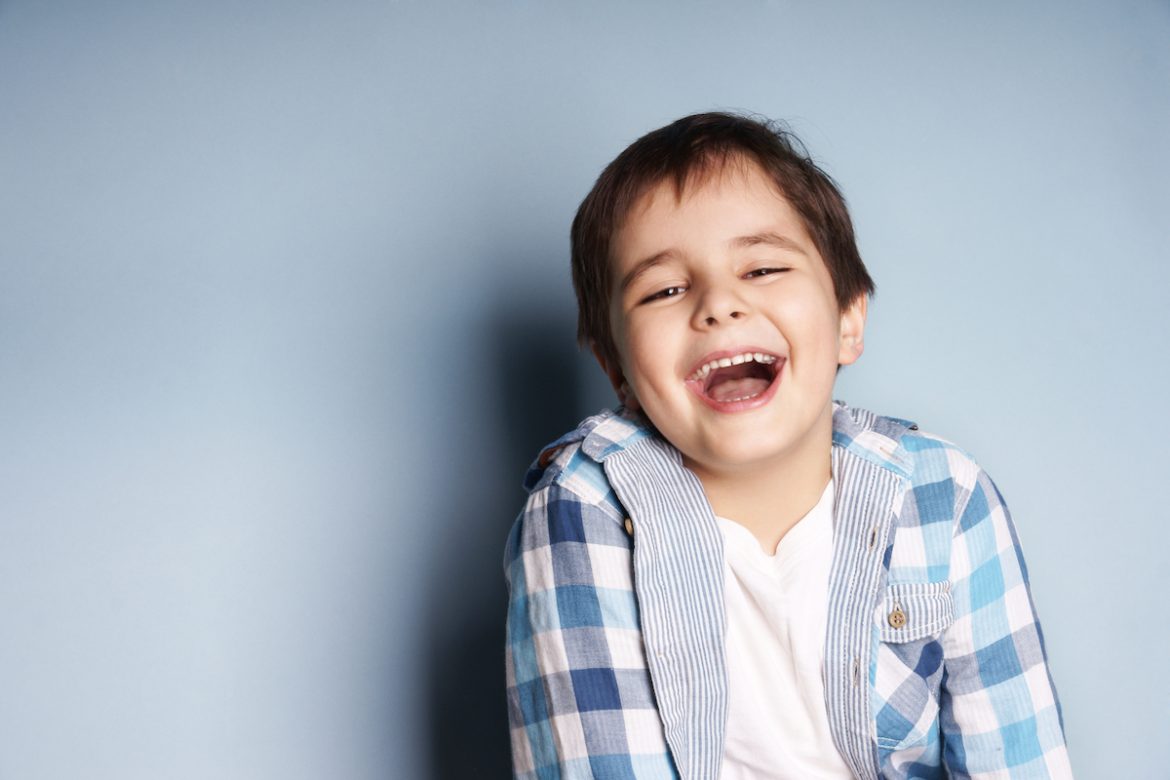 young boy smiling