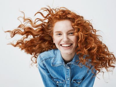 woman with wild curly red hair